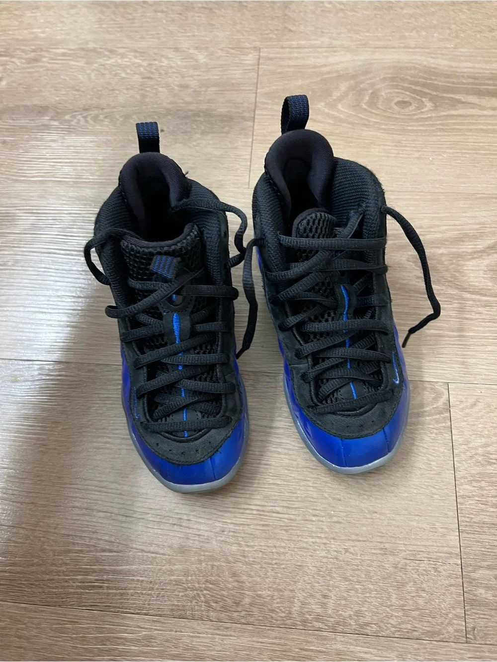 Nike Kids Black and Royal Blue Foamposite Sneakers